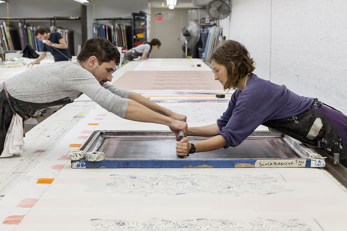 Fall 2019 Apprentices Brice Peterson and Sonja Burniston in the FWM print studios.