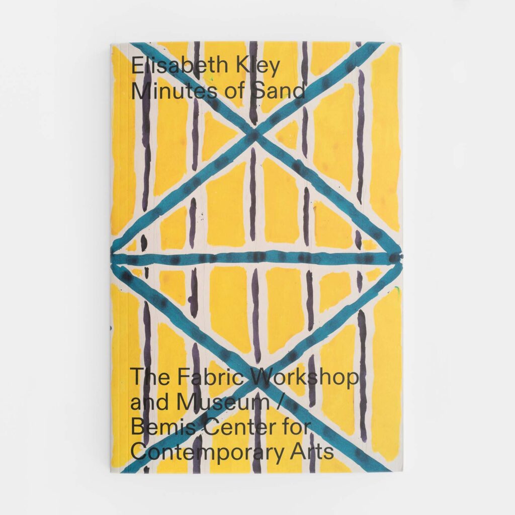 An image of a book with a yellow, teal, and charcoal geometric, abstract watercolor and pencil drawing on the cover. The title reads: 