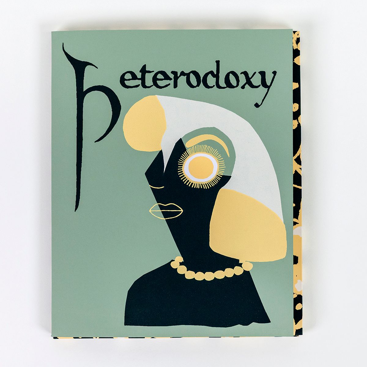 An art-deco inspired illustration of a woman wearing pearls screenprinted on the cover of a book titled 