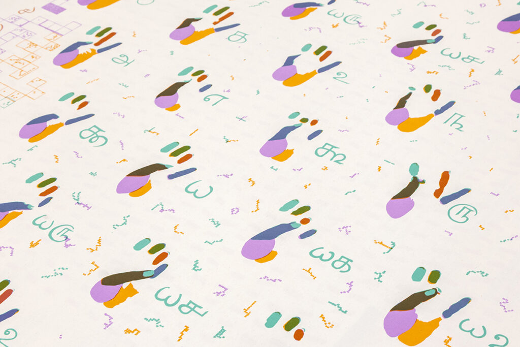 A colorful motif of photocopied hands counting to 16. Tamil numerals accompany the corresponding gestures.