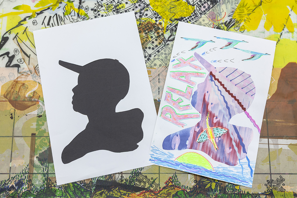Two drawings on paper side by side. On the left is a solid black profile of a person against a white background. On the right is the same profile but filled in with vibrant colors and symbolic sketches around the profile.